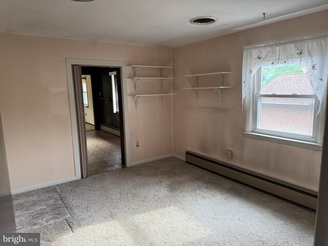 402 W Summit St, Mohnton, PA 19540 - spare room with a baseboard radiator, carpet, and baseboards