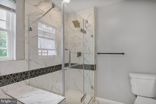 3604 White Ave, Baltimore, MD 21206 - bathroom featuring healthy amount of natural light, a marble finish shower, and toilet