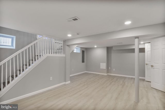 3604 White Ave, Baltimore, MD 21206 - basement with stairway, wood finished floors, electric panel, baseboards, and recessed lighting
