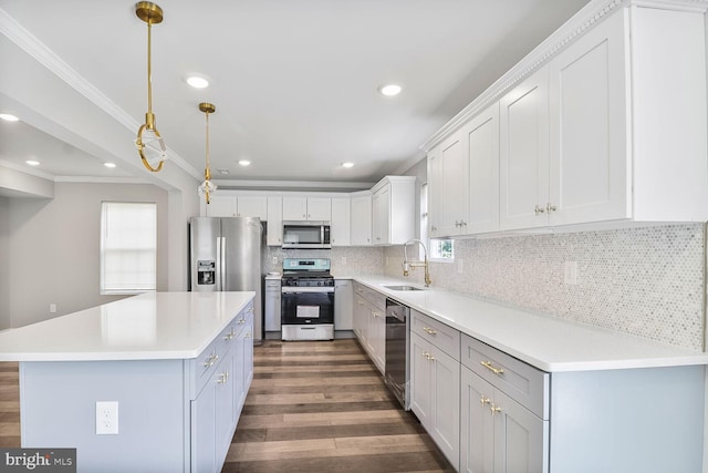 3604 White Ave, Baltimore, MD 21206 - kitchen with appliances with stainless steel finishes, a sink, ornamental molding, dark wood-style flooring, and tasteful backsplash