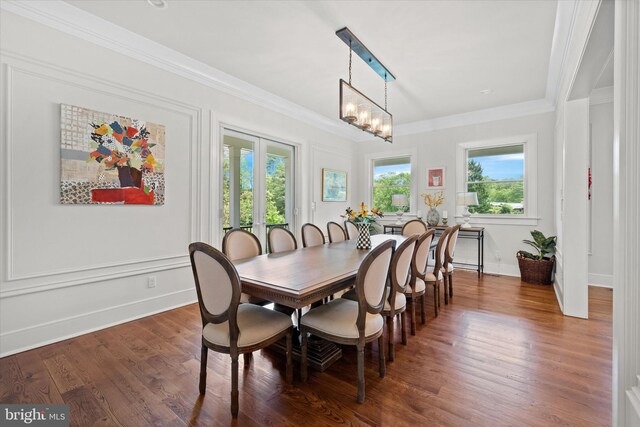 5 Raintree Rd, Chadds Ford, PA 19317 - dining room featuring a chandelier, ornamental molding, wood finished floors, and baseboards