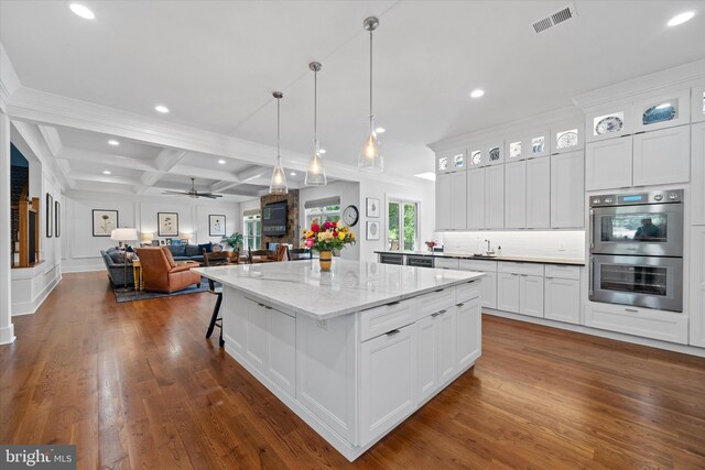 5 Raintree Rd, Chadds Ford, PA 19317 - kitchen featuring stainless steel double oven, recessed lighting, a kitchen island, open floor plan, and white cabinets