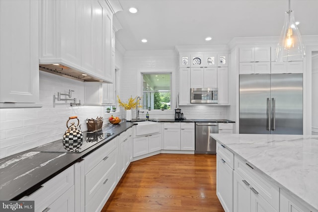 5 Raintree Rd, Chadds Ford, PA 19317 - kitchen with stainless steel appliances, a sink, white cabinets, decorative backsplash, and recessed lighting