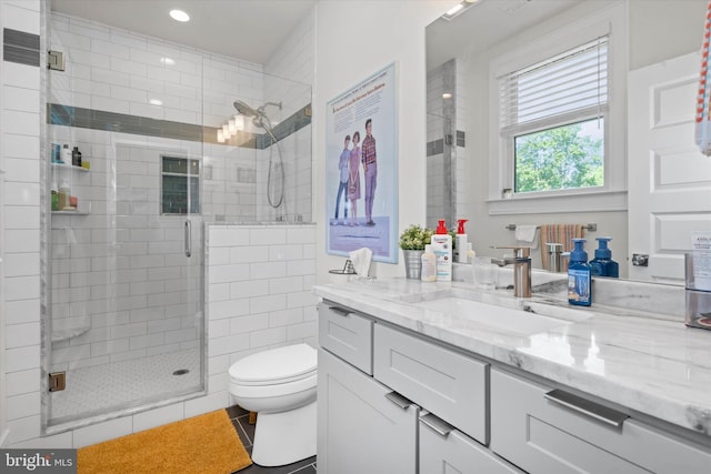5 Raintree Rd, Chadds Ford, PA 19317 - bathroom featuring vanity, a stall shower, toilet, tile patterned floors, and recessed lighting