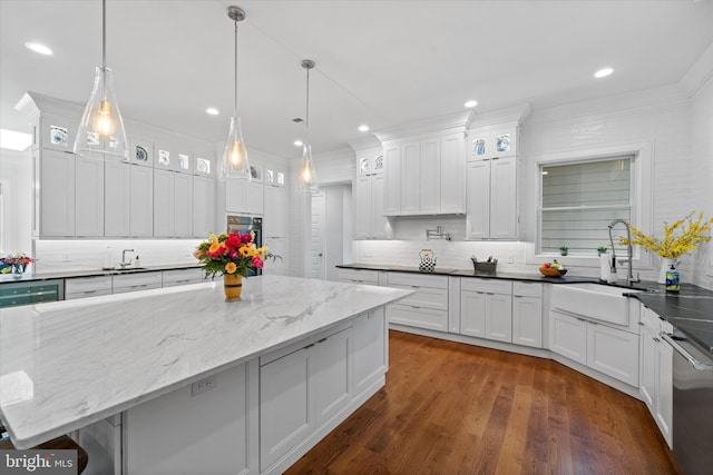 5 Raintree Rd, Chadds Ford, PA 19317 - kitchen featuring a sink, decorative backsplash, white cabinetry, recessed lighting, and crown molding