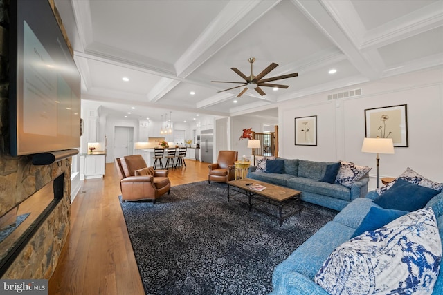 5 Raintree Rd, Chadds Ford, PA 19317 - living area featuring coffered ceiling, ceiling fan, light wood-type flooring, beam ceiling, and crown molding