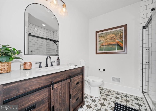 5 Raintree Rd, Chadds Ford, PA 19317 - bathroom featuring vanity, a tile shower, toilet, and tile patterned floors