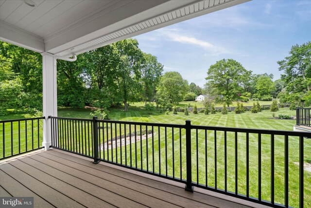 5 Raintree Rd, Chadds Ford, PA 19317 - deck featuring view of scattered trees and a lawn