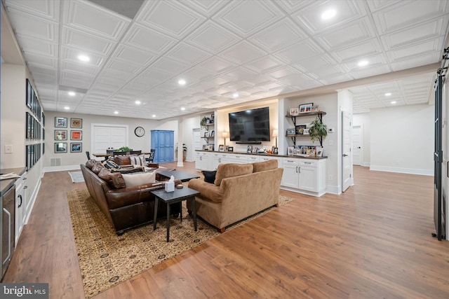 5 Raintree Rd, Chadds Ford, PA 19317 - living area featuring recessed lighting, light wood-type flooring, baseboards, and an ornate ceiling