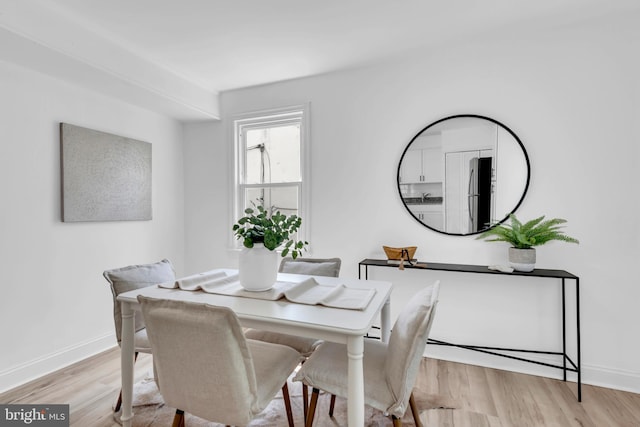 4428 Edson Pl NE, Washington, DC 20019 - dining space with baseboards and light wood finished floors
