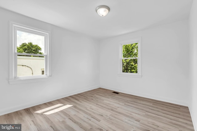 4428 Edson Pl NE, Washington, DC 20019 - spare room with light wood-type flooring and baseboards