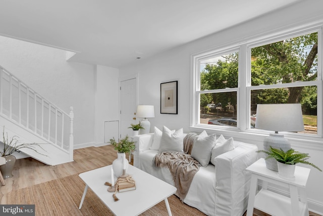 4428 Edson Pl NE, Washington, DC 20019 - living area with stairs and light wood finished floors