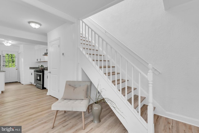 4428 Edson Pl NE, Washington, DC 20019 - stairway featuring wood finished floors and baseboards