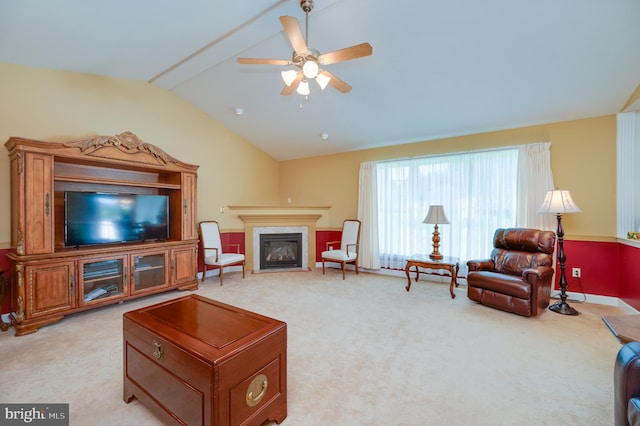 314 Valley Ct, Sinking Spring, PA 19608 - living area with light carpet, lofted ceiling, a ceiling fan, and a fireplace with flush hearth