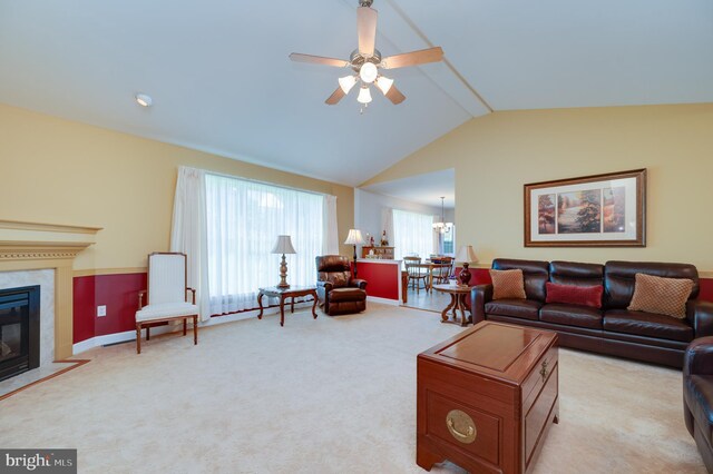 314 Valley Ct, Sinking Spring, PA 19608 - living room featuring lofted ceiling, ceiling fan, a premium fireplace, and light colored carpet