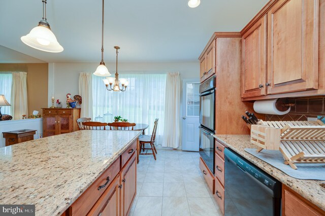 314 Valley Ct, Sinking Spring, PA 19608 - kitchen featuring black appliances, decorative backsplash, plenty of natural light, and light stone countertops