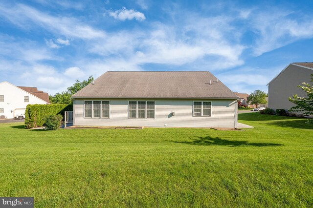 314 Valley Ct, Sinking Spring, PA 19608 - rear view of house with a lawn