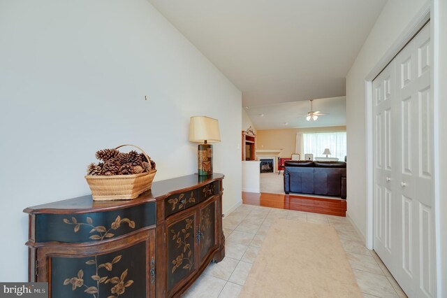 314 Valley Ct, Sinking Spring, PA 19608 - corridor featuring light tile patterned floors and lofted ceiling