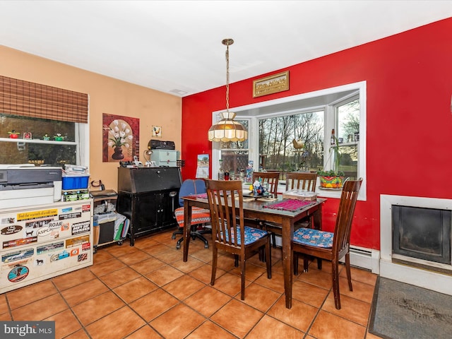 dining space with tile patterned floors
