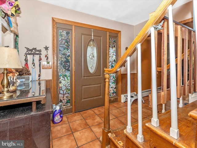 tiled foyer featuring stairway