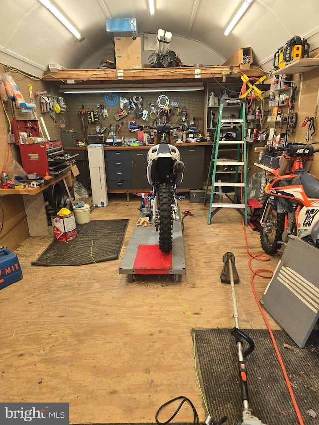 garage featuring a workshop area