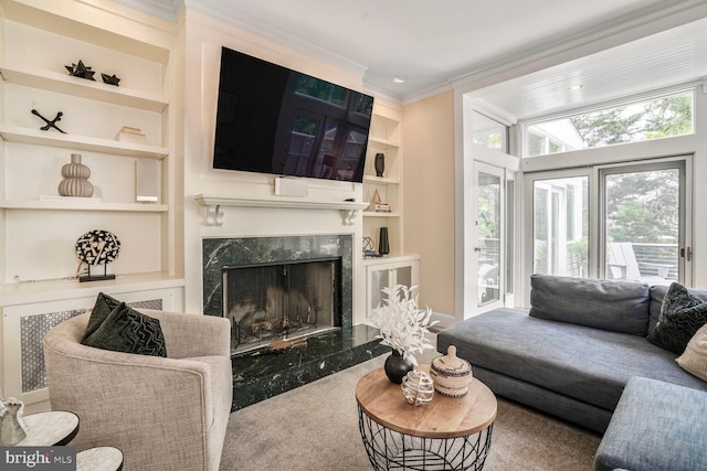 3707 Thornapple St, Chevy Chase, MD 20815 - living area featuring built in features, crown molding, carpet floors, and a high end fireplace