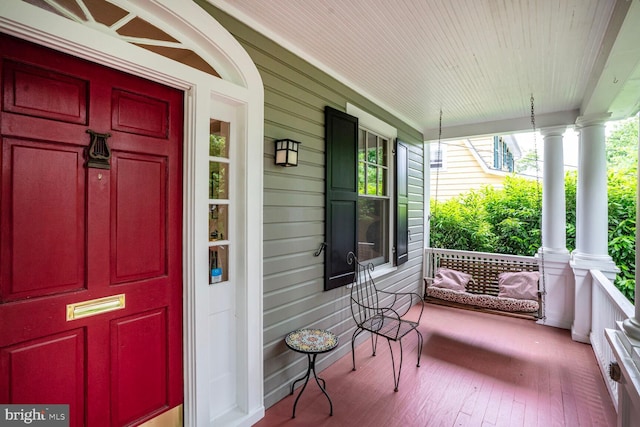 3707 Thornapple St, Chevy Chase, MD 20815 - doorway to property with a porch