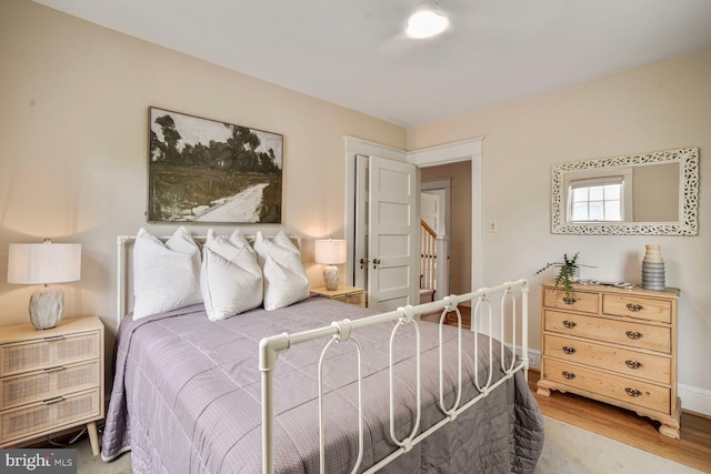 3707 Thornapple St, Chevy Chase, MD 20815 - bedroom with wood finished floors and baseboards