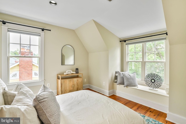 3707 Thornapple St, Chevy Chase, MD 20815 - bedroom featuring multiple windows, lofted ceiling, baseboards, wood finished floors, and recessed lighting