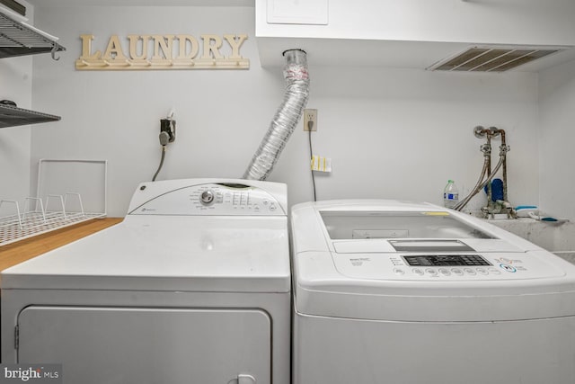 3707 Thornapple St, Chevy Chase, MD 20815 - washroom featuring separate washer and dryer