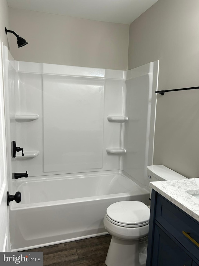 14400 Northumberland Hwy, Heathsville, VA 22473 - full bath featuring vanity, shower / washtub combination, wood finished floors, and toilet