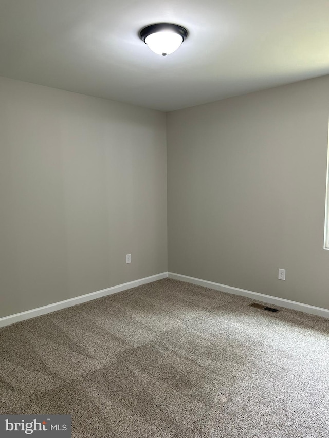 14400 Northumberland Hwy, Heathsville, VA 22473 - carpeted spare room featuring baseboards