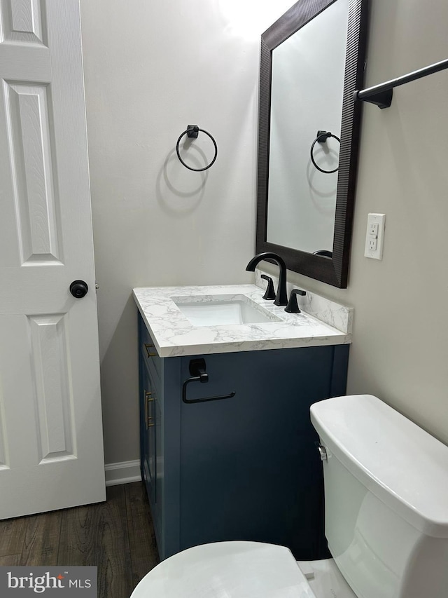 14400 Northumberland Hwy, Heathsville, VA 22473 - half bath featuring toilet, vanity, and wood finished floors
