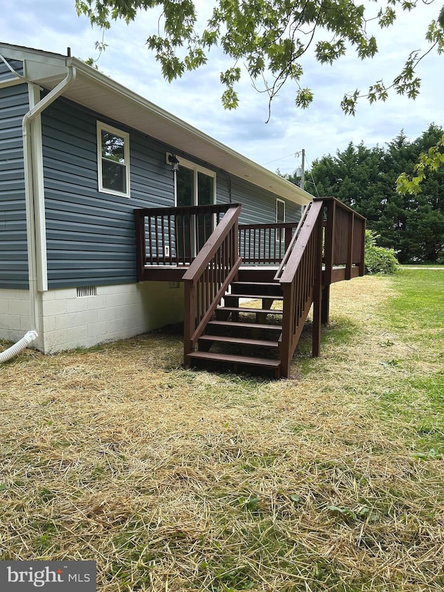 14400 Northumberland Hwy, Heathsville, VA 22473 - rear view of property featuring a wooden deck, stairway, and a yard