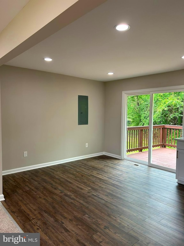 14400 Northumberland Hwy, Heathsville, VA 22473 - unfurnished room featuring electric panel, dark wood-type flooring, baseboards, and recessed lighting