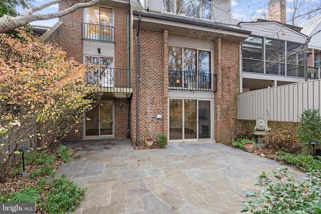 710 Belgrove Rd, Mclean, VA 22101 - back of property with brick siding and a patio