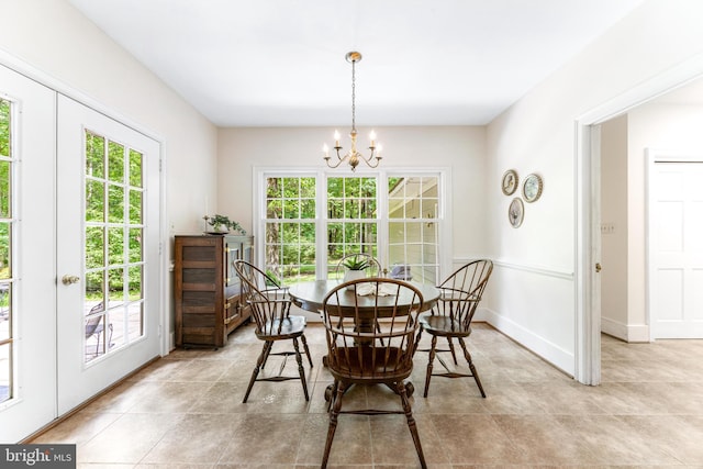 16909 Batchellors Forest Rd, Silver Spring, MD 20906 - dining room featuring healthy amount of natural light, a chandelier, and light tile patterned flooring