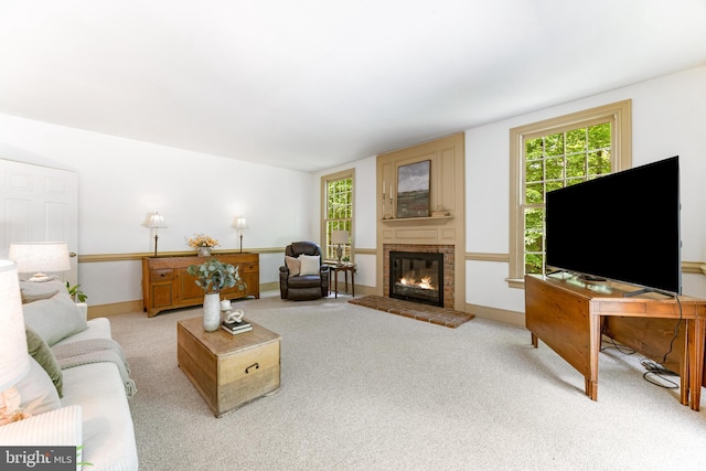 16909 Batchellors Forest Rd, Silver Spring, MD 20906 - living room featuring light carpet, a brick fireplace, and baseboards