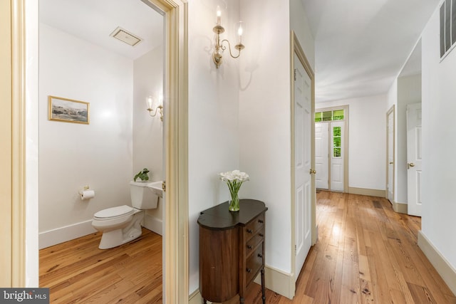 16909 Batchellors Forest Rd, Silver Spring, MD 20906 - hallway featuring light wood-style flooring and baseboards