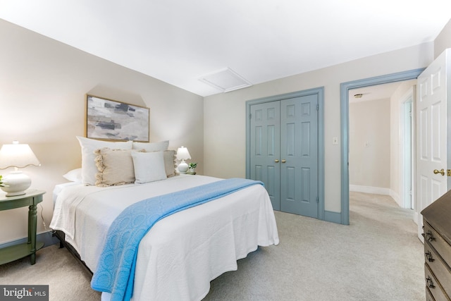 16909 Batchellors Forest Rd, Silver Spring, MD 20906 - bedroom with attic access, light carpet, a closet, and baseboards
