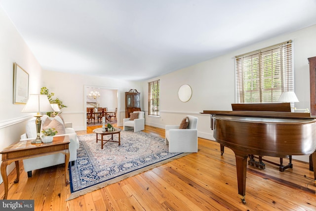 16909 Batchellors Forest Rd, Silver Spring, MD 20906 - living area with plenty of natural light, hardwood / wood-style flooring, and a chandelier