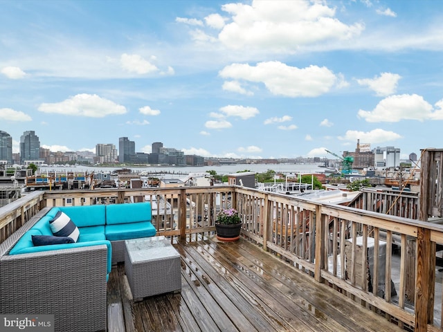 628 E Fort Ave, Baltimore, MD 21230 - wooden deck featuring a skyline view and an outdoor hangout area