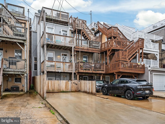 628 E Fort Ave, Baltimore, MD 21230 - view of property featuring central air condition unit and stairway