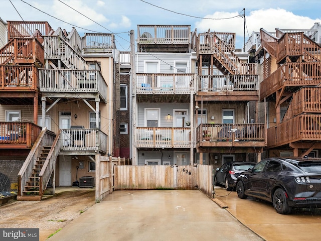 628 E Fort Ave, Baltimore, MD 21230 - view of property with stairway and central AC