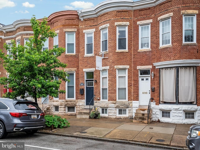 628 E Fort Ave, Baltimore, MD 21230 - view of property featuring entry steps and brick siding