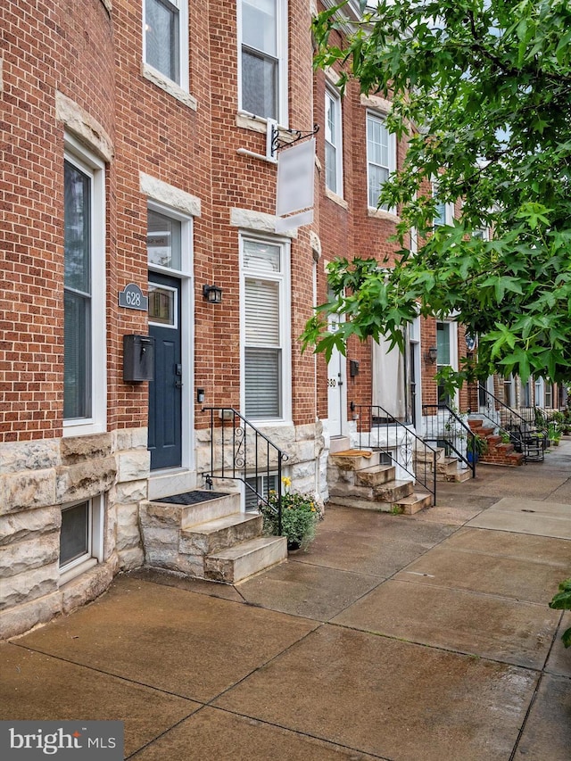 628 E Fort Ave, Baltimore, MD 21230 - entrance to property with brick siding and stone siding