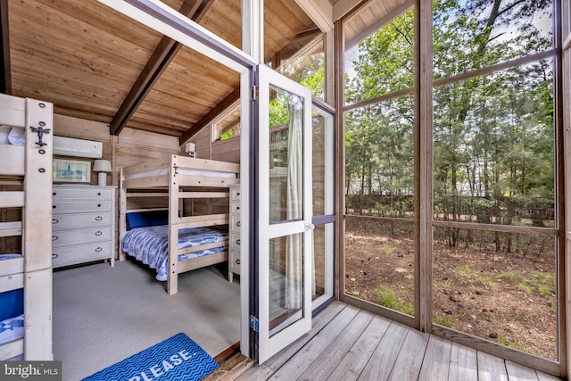 17 Robins Ln, Rehoboth Beach, DE 19971 - unfurnished bedroom with wooden ceiling, multiple windows, and hardwood / wood-style flooring