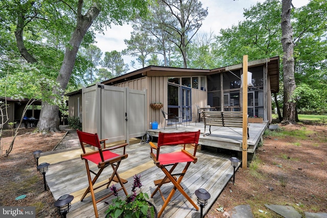 17 Robins Ln, Rehoboth Beach, DE 19971 - deck featuring a sunroom