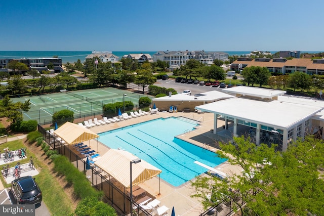 17 Robins Ln, Rehoboth Beach, DE 19971 - community pool featuring a water view and a diving board