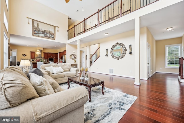 15613 Ancient Oak, North Potomac, MD 20878 - living area with a high ceiling and dark wood-style flooring